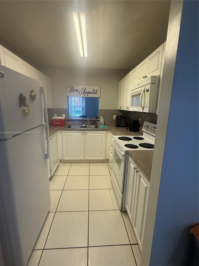 Building Photo - 7145 NW 173rd Dr