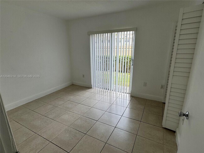 Building Photo - 8695 NW 6th Ln