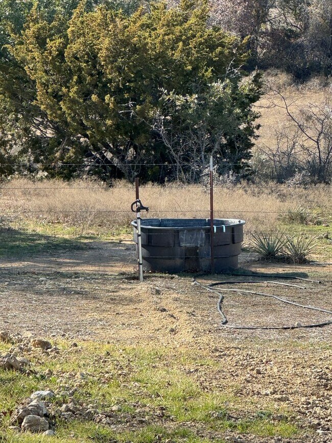 Building Photo - 4 Acres + METAL SHOP + Horses Welcome