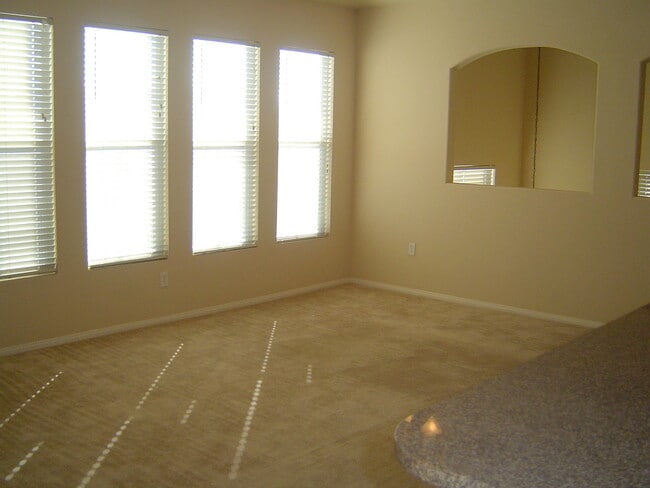 Building Photo - Move-In Ready Condo with Private Balcony & Modern Upgrades