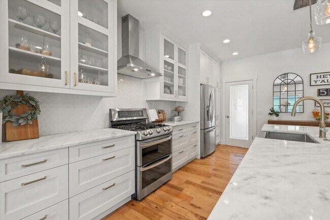 Building Photo - unning custom-built home on a full acre in...