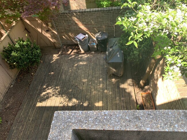 View of rear patio from master bedroom balcony - 389 N St SW