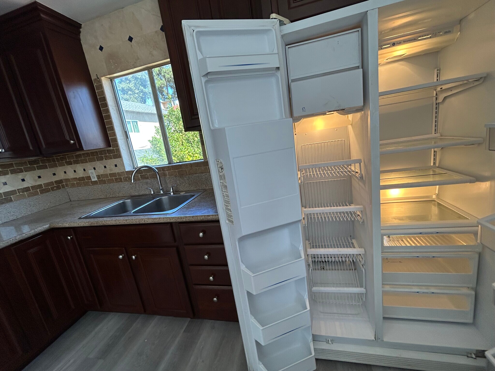 Two door refrigerator - 1156 N Chicago St
