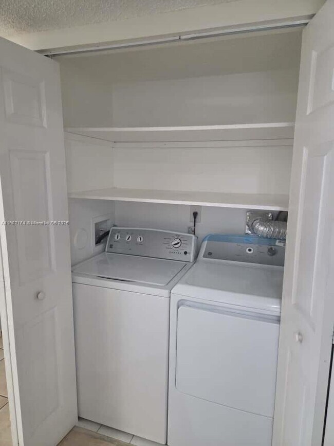 Building Photo - 7406 Woodmont Terrace