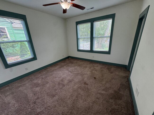 Building Photo - Modern Bungalow Charm: Designer Finishes & Expansive Backyard Living!