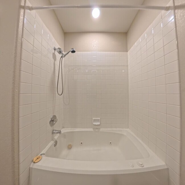 Building Photo - Beautifully Renovated 2nd-Floor Condo in Prime Location