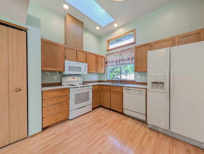 Building Photo - Tri-Level Home w/ Bonus Room, 2-Car Garage & Fenced Yard!