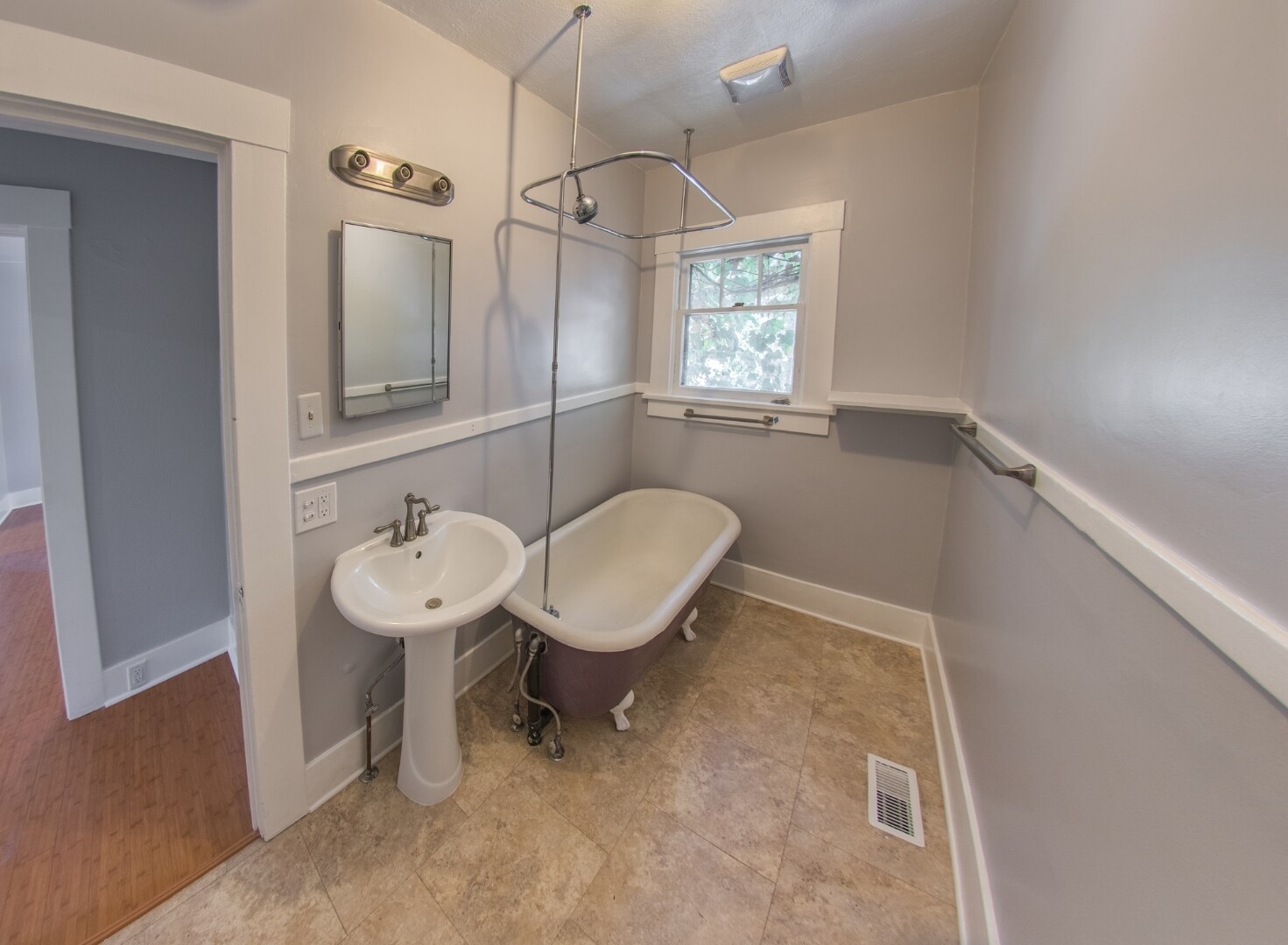 Claw tooth tube and pedestal sink with new floors &amp; fixtures. - 127 1/2 Keystone Ave