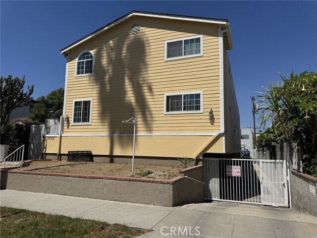 Building Photo - 7039 Remmet Ave
