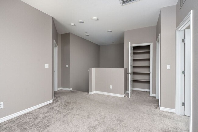 Building Photo - Modern Henderson Townhome with Loft & Resort-Style Amenities