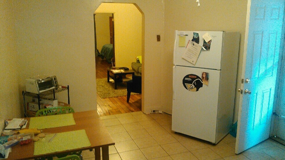 Kitchen looking into livingroom - 134 S 25th St