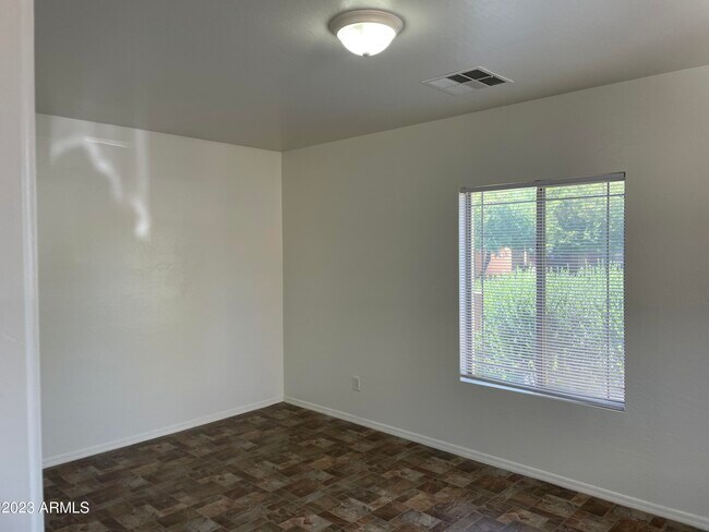 Building Photo - 23576 W Pecan Rd