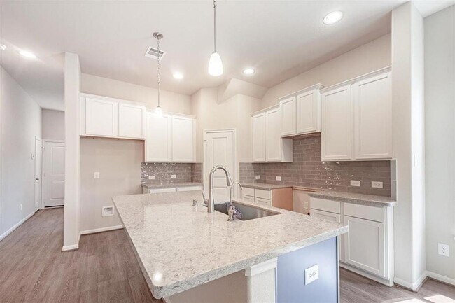 Building Photo - AVAILABLE NOW! This  3 bedroom, 2.5 bath, 1.5 story home is located in the convenient location of...