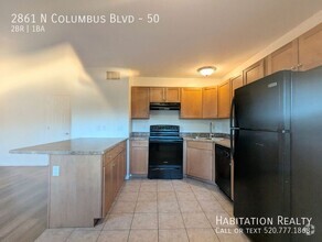 Building Photo - Beautiful 2bd/1ba Condo w/ Enclosed Yard a...