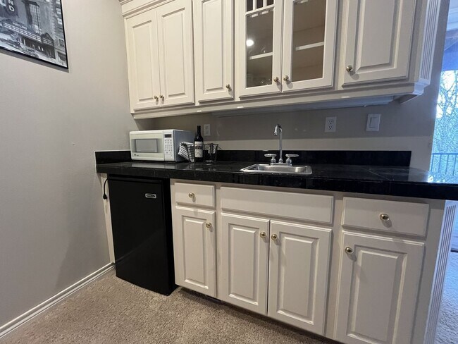 Building Photo - Executive-Style Northwest Heights Home with Forest Views and Refined Architectural Details