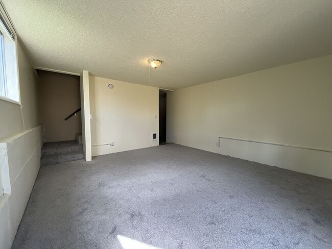 Building Photo - Spacious 3 Bedroom with Bonus Living Area, Patio & Built in Fireplace