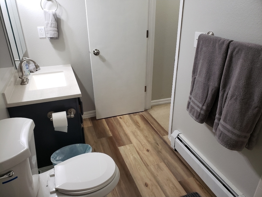 Upstairs full bathroom with a tub/shower combo - 625 E 22nd Ave
