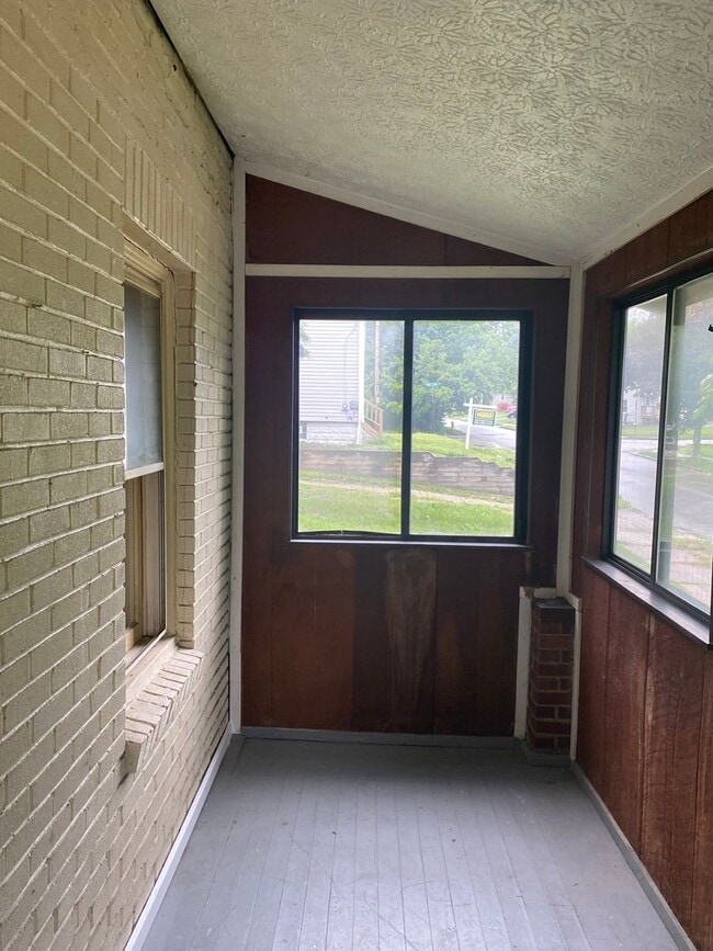 Building Photo - One Bedroom Duplex with off street parking and private enclosed porch