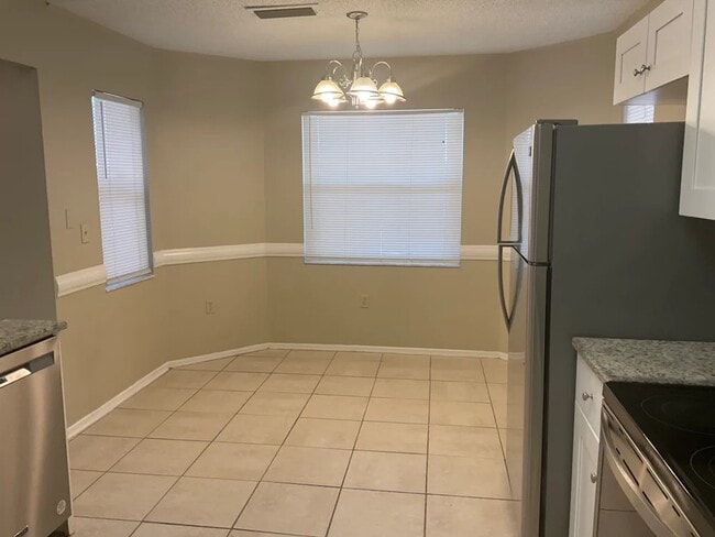 Building Photo - 6317 8th Ct E