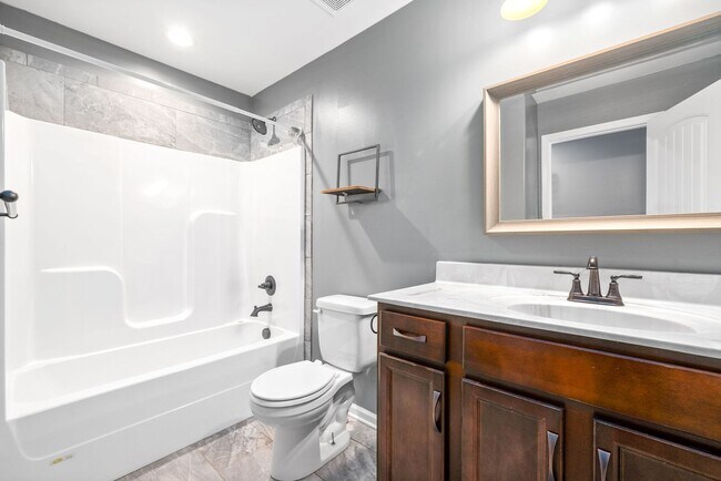 Building Photo - Pet Friendly Four Bedroom with Bonus!