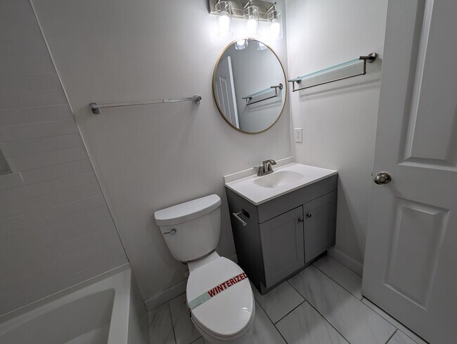 Building Photo - Pristine End Unit Townhome located in the Prosperity Place community!