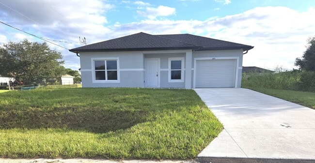 Building Photo - Brand-New 2/2/1 -SW Lehigh Acres-See this ...