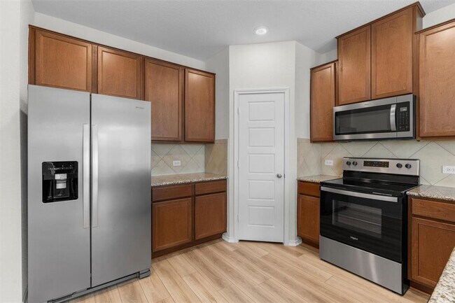 Building Photo - 7705 Song Sparrow Dr.