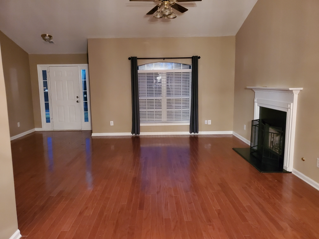 living room with fire place - 9425 Rivertown Rd