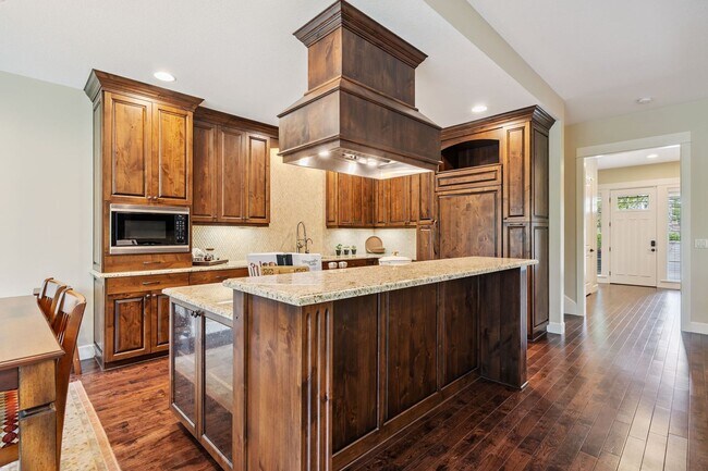 Building Photo - 2 Creeks Condominiums - Gated Community on...