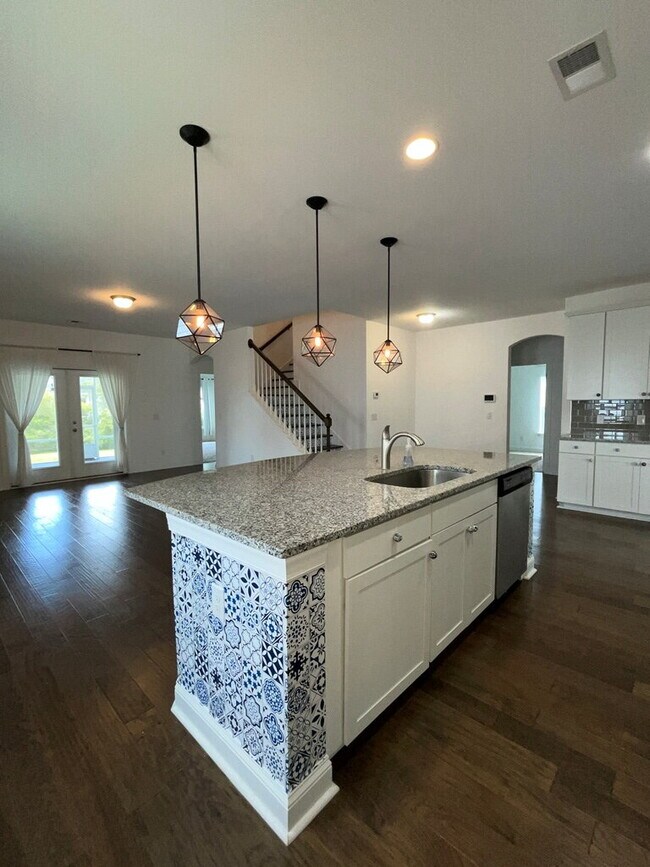 Building Photo - "Spacious 4-Bed Oasis with Stunning Lake V...