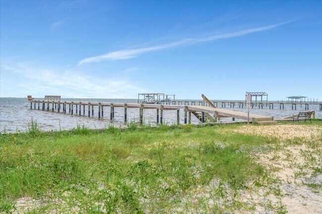 Building Photo - Community Pool & Deeded Access to Santa Ro...