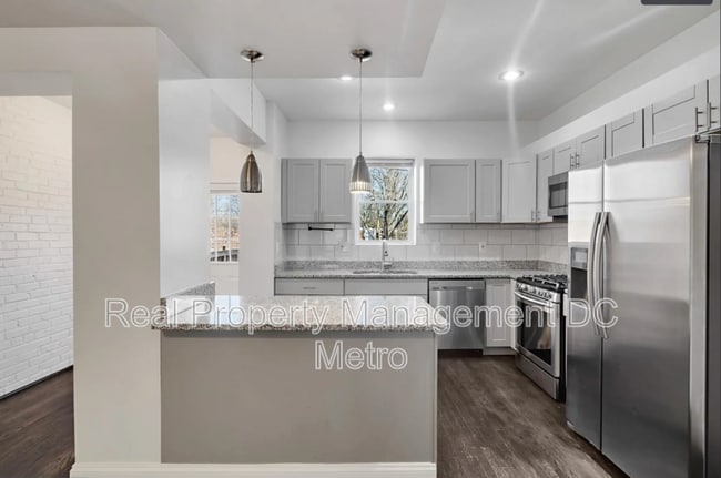 Building Photo - 1397 Sheridan St NW