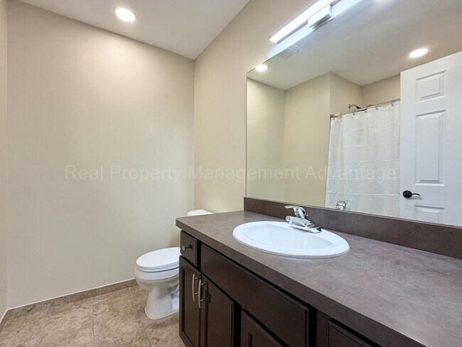 Building Photo - Rare Corner Upper Condo with Vaulted Ceilings, Private Balcony and 2 Car Garage - Right Across fr...