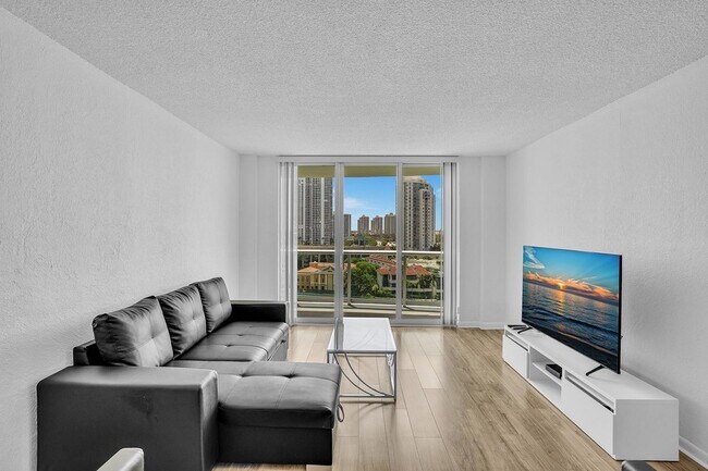 Building Photo - 19390 Collins Ave
