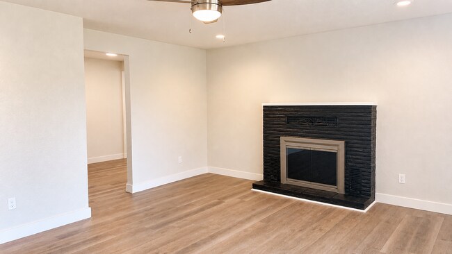 Building Photo - Renovated 3-Bedroom Home with Fenced Yard, Fireplace & In-Unit Laundry