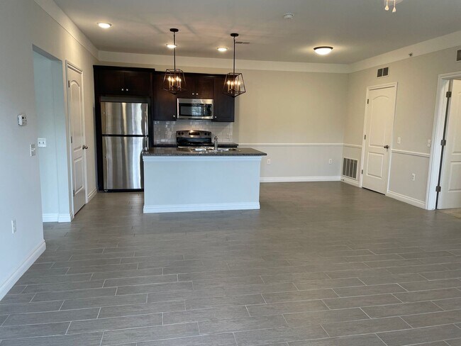 Building Photo - Shelby Township, 1st Floor  2-Bedroom, 2- Baths, Private Patio with att. Garage