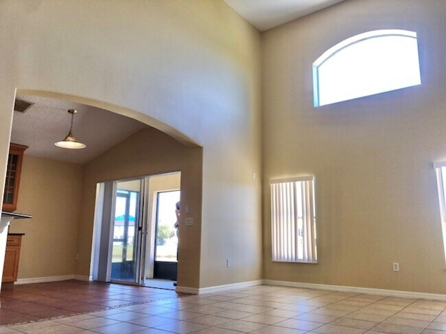 Building Photo - EAGLE CREEK LAKE NONA! WELCOME HOME! Beautiful water views! Spacious 2 story-3 bedroom 2.5 bath h...