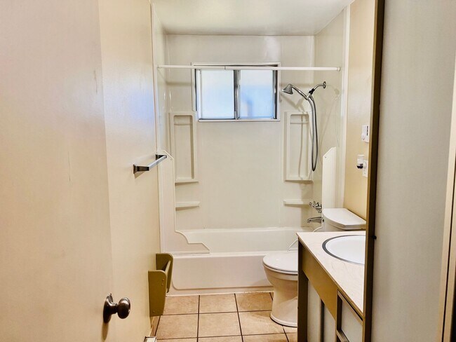 Building Photo - Charming 3BR/1BA w/ 1-car garage, long driveway, fenced yard, wood stove & shed/workshop.