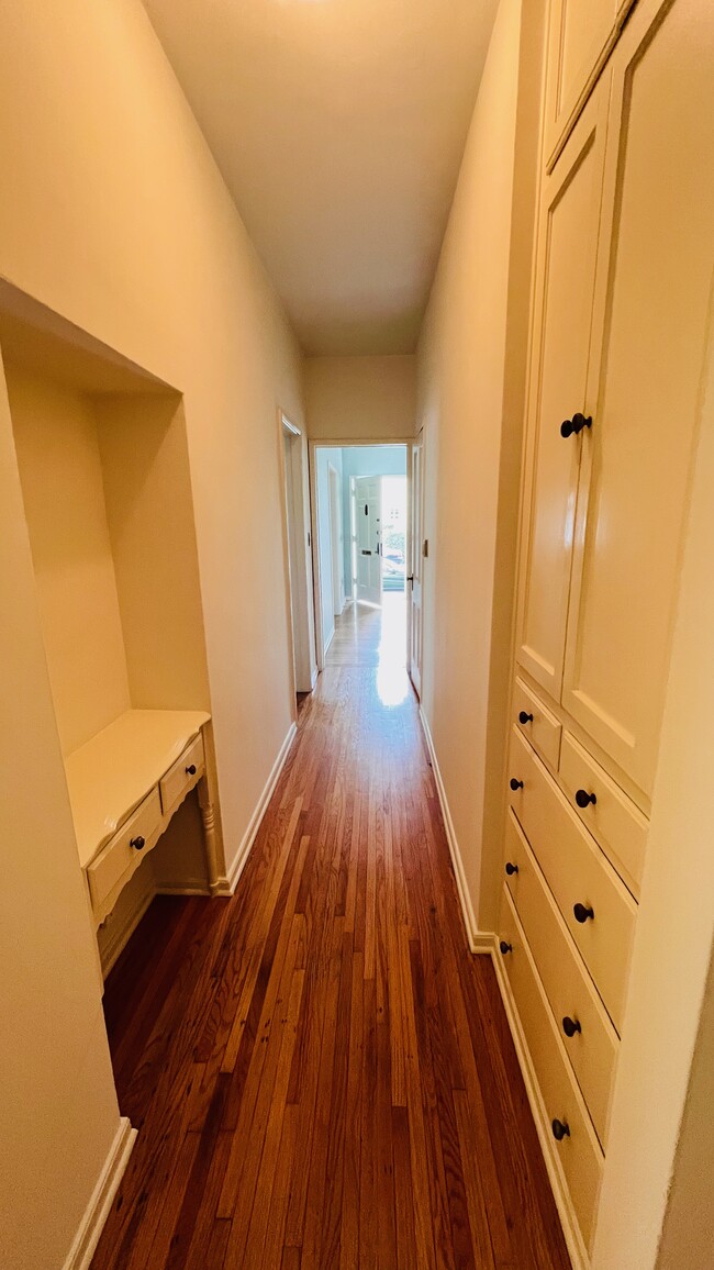 Hallway with 2 closets and Built-In Storage - 1064 S Orange Grove Ave