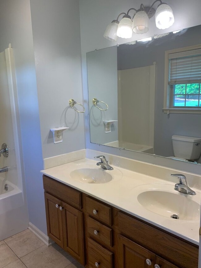 Building Photo - CONTRACT PENDING!! Lovely single family, brick rancher home with 3 beds/2.5 baths!!