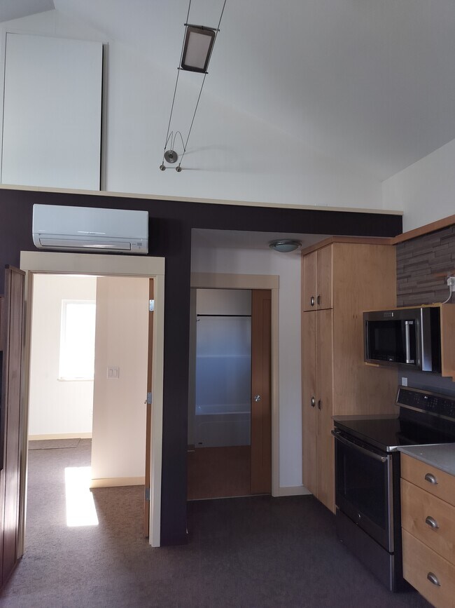 Kitchen, bathroom, main room with AC and heat - 16261 SE Sun Ave