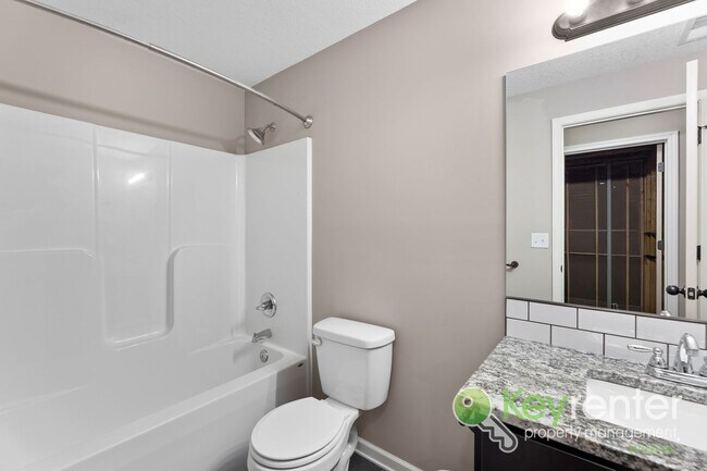 Building Photo - Spacious 4-Bedroom Home with Finished Basement & 3-Car Garage – Derby, KS