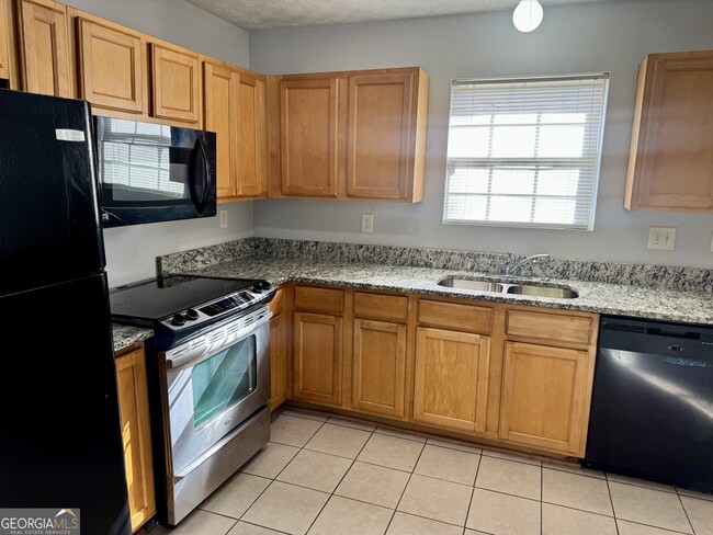 Building Photo - 5663 Windfall Ln