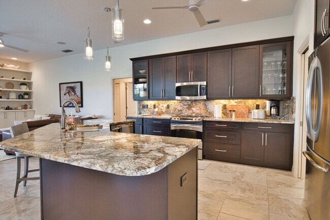 Building Photo - Luxury Home with Saltwater Heated Pool, Spa & Spectacular Golf Course Views, and includes Social ...