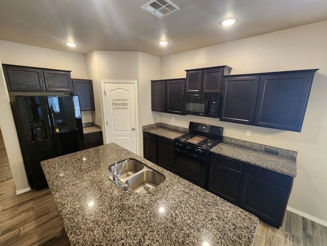 Building Photo - 7039 Chaco St