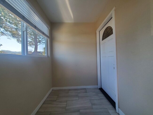 Building Photo - Private 2x2 Santa Rosa Townhouse with pool, 2-car garage, workshop area, fireplace, W/D Hookups