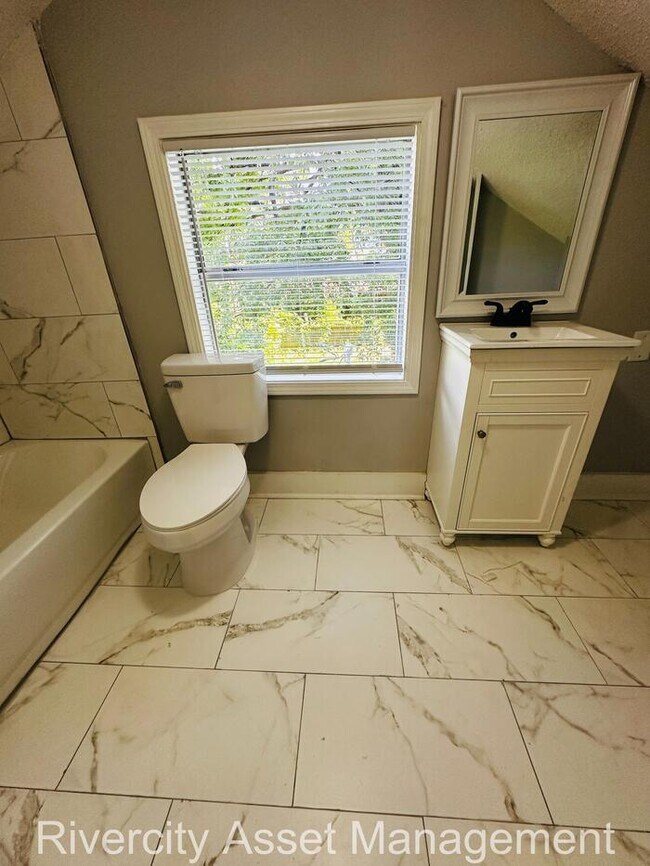 Building Photo - Move-In Ready! Stunning 4-Bedroom, 2-Bath ...
