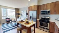 Upscale kitchen featuring gas cook top and french door refridgerator - Modera Glendale