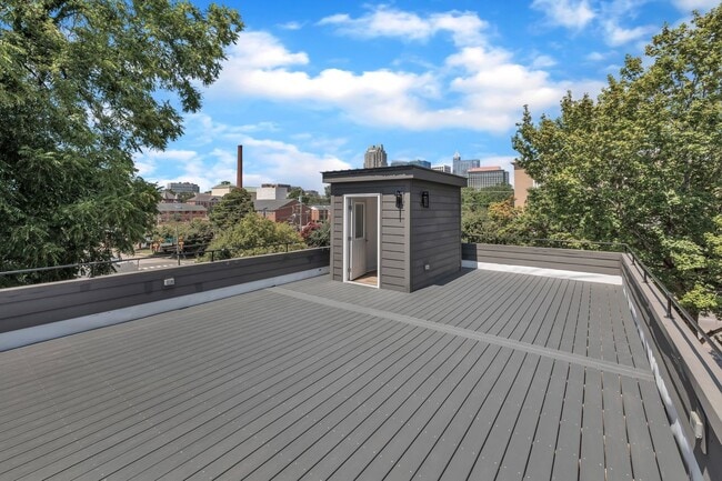 Building Photo - Modern New Construction Townhome with Roof...