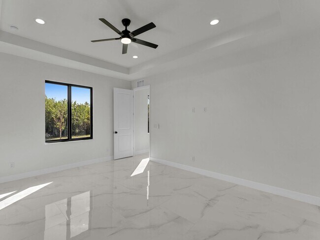 Building Photo - Brand-New Home for Rent – Port Charlotte, FL 33981. Qualify for a deposit-free option and save on...